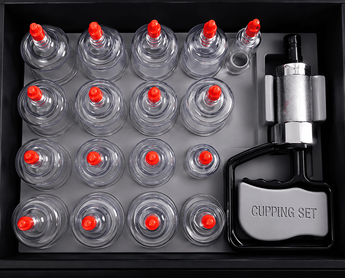 Clean cupping therapy set and pump used for bodywork at Muscle Movement and Improvement